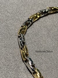 Bracciale in oro bianco e giallo 750/ pinzata